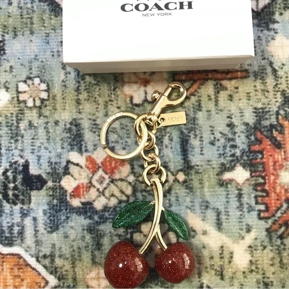 Coach Cherry Keychain - Gold and Red - Picture 1 of 4